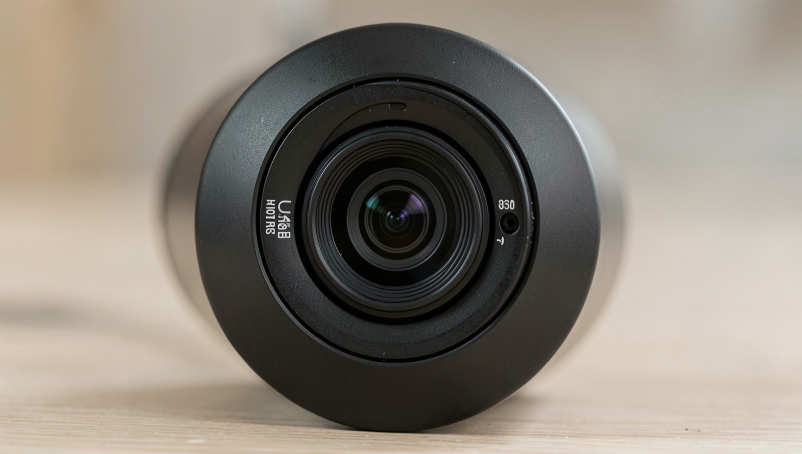 Webcam cover in use, preventing unauthorized access to the camera.